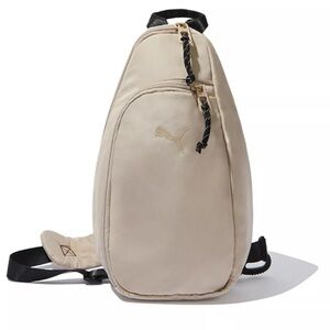 Puma cross shoulder/zip/handbag. Light beige. New with tags.